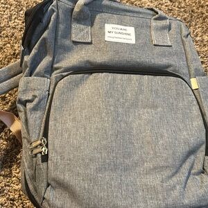 Diaper bag with changer